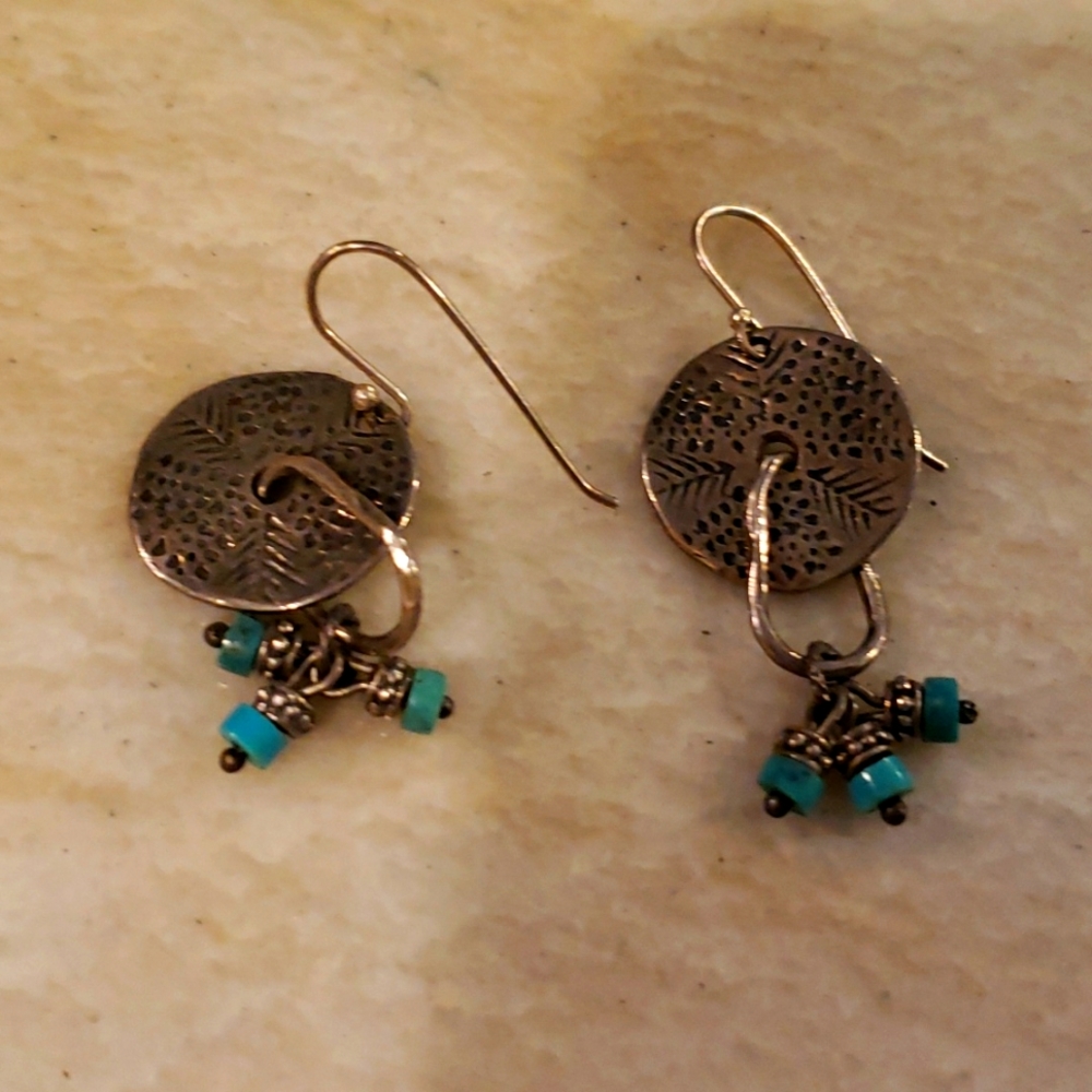 Pierced earrings.